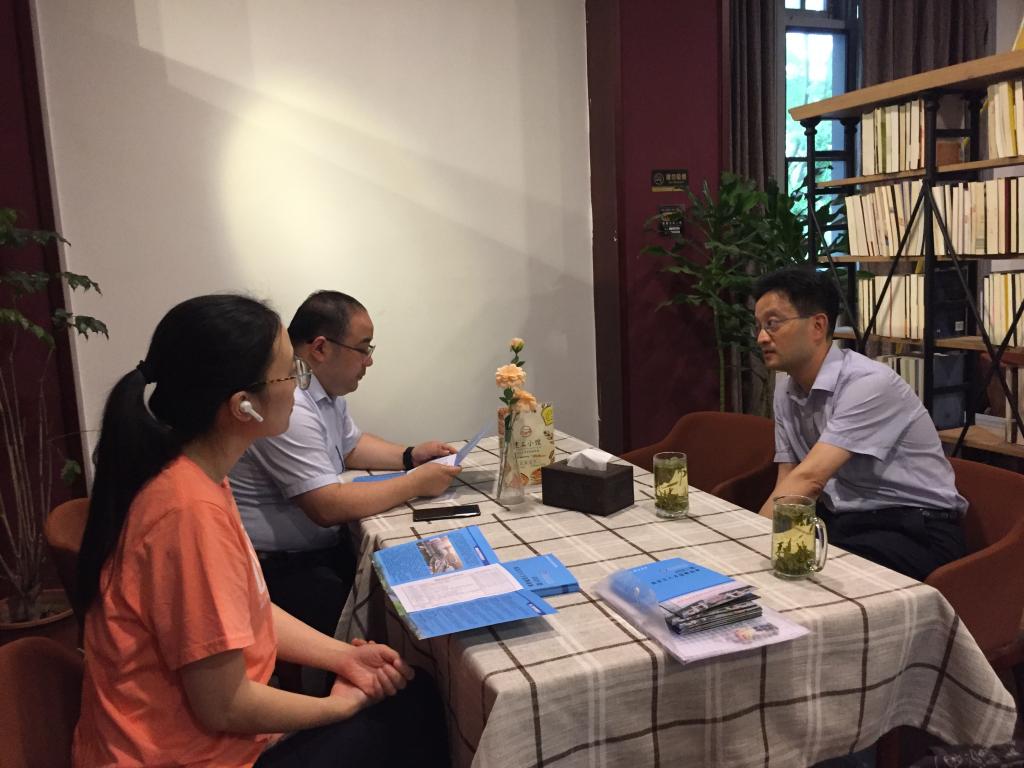 与重庆大学土木工程学院相关人员交流