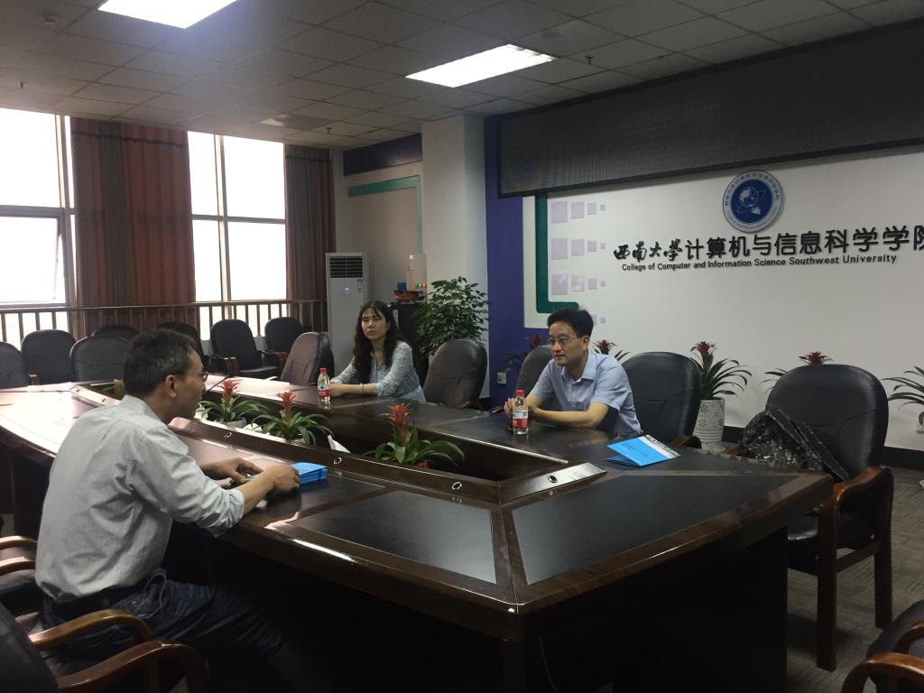 在西南大学计算机与信息科学学院软件学院与相关人员交流